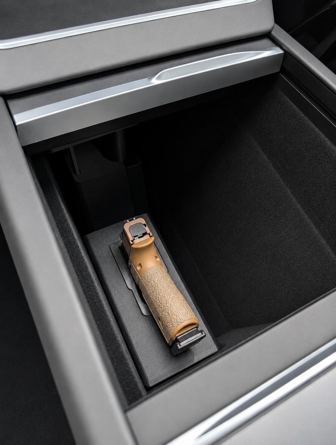 A custom fit holster for tesla model y 25+ that conceals in the center console
