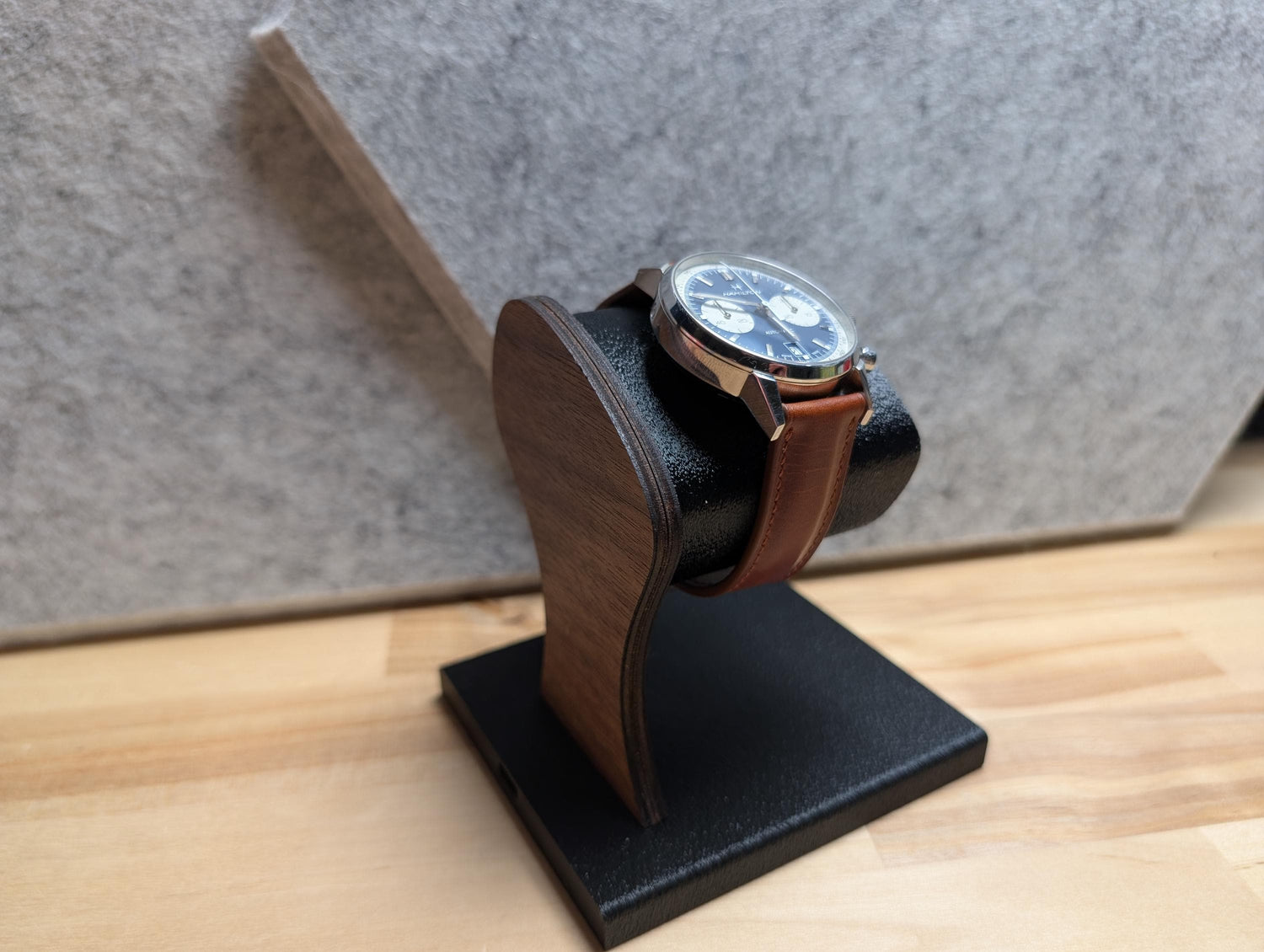 Modular watch stand with wood and acrylic riser options